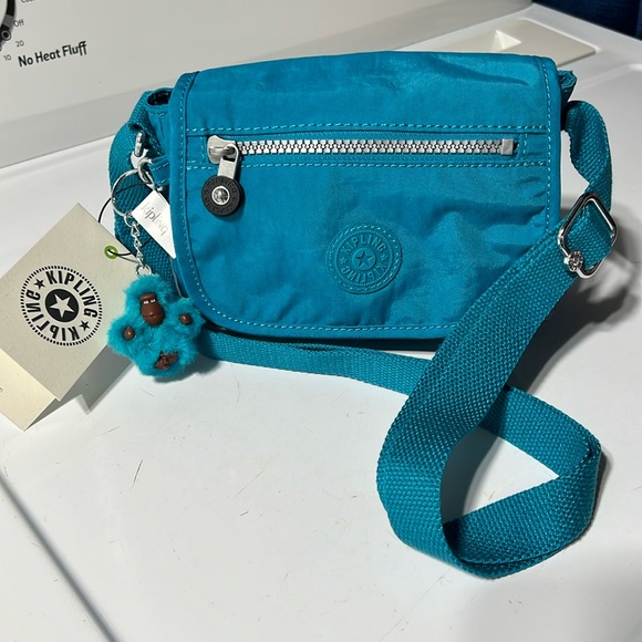 Kipling Handbags - Kipling Teal Crossbody Bag with Monkey Charm